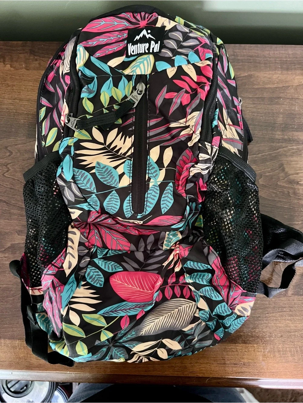 New- Never used. Floral Leaf Print lightweight packable Backpack - Black/Multi